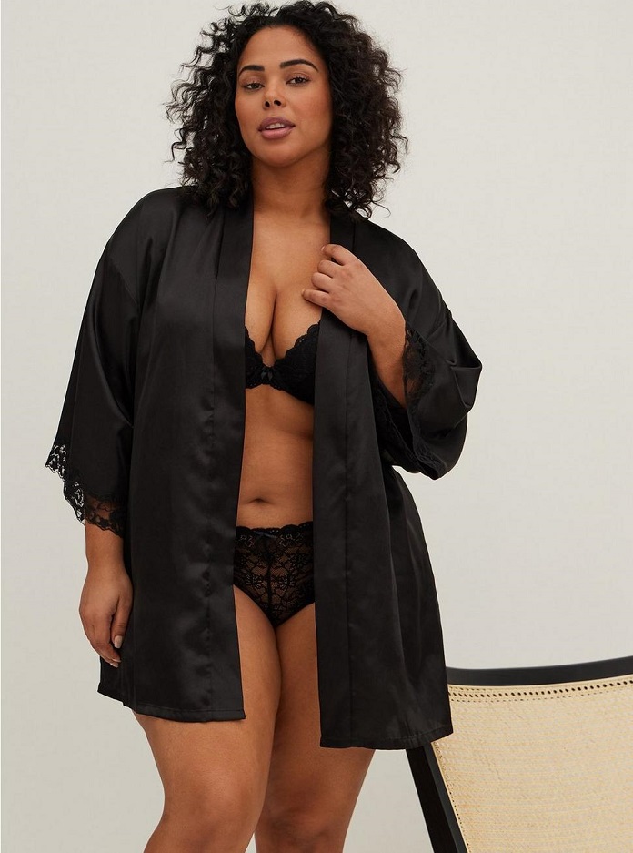 woman wearing a black plus size lingerie robe