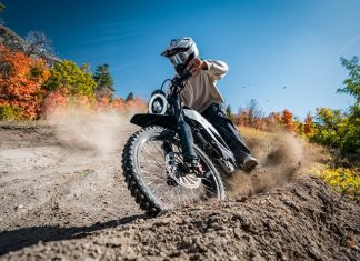 person riding e motorcycle in the nature