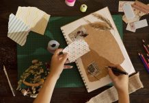 woman scrapbooking at home