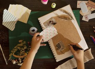 woman scrapbooking at home