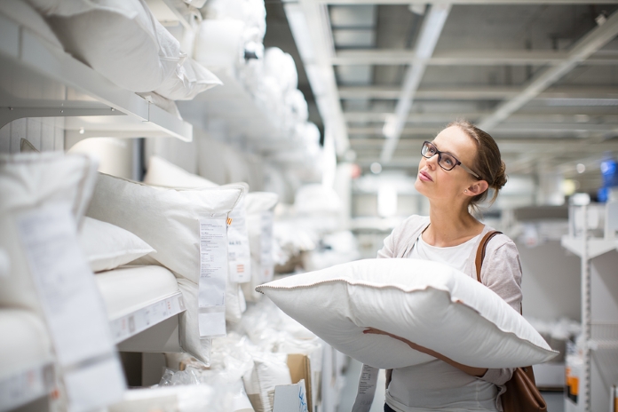 woman choosing a pillow for sleeping